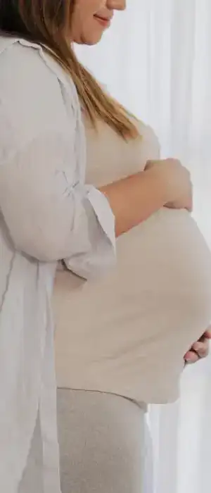pregnancy-woman-hugging-her-tummy-and-feel-happy-w-2023-11-27-05-30-12-utc